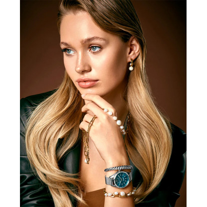 Pulsera Chic de acero en Ip dorado y perla cultivada