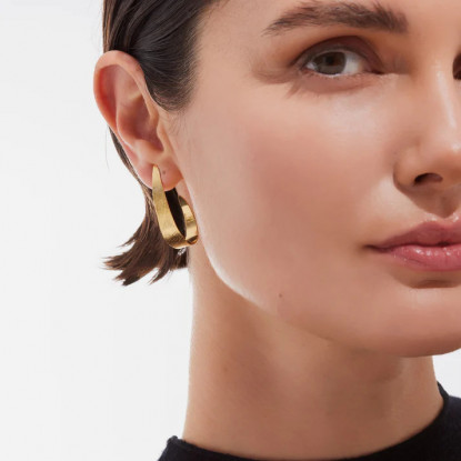 Pendientes aro y plata bañado en oro. Tamaño del motivo de 3,5x2cm de la colección Noise
